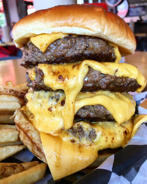 Roadstar Burger from American Burger Company, a multi-stack Burger with American cheese