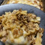 Baked pasta dish with noodles, cheese and beef