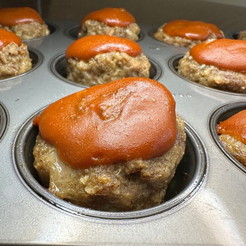 baked meatloaf in a muffin tin