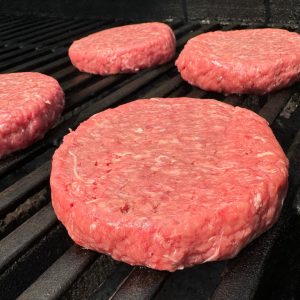 schweid and sons 5.3 oz burger patties on the grill