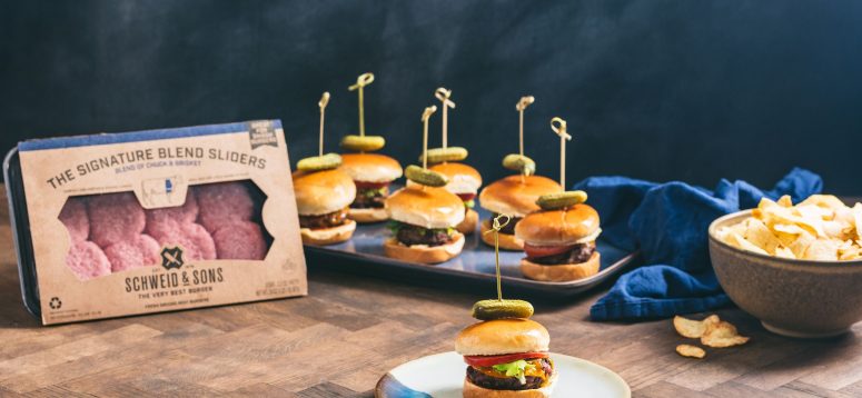 Cook up some Sliders for the ultimate at home tailgating party! Pictured are packaged Schweid & Sons Signature Blend Sliders with cooked sliders topped with tomatoes and pickles