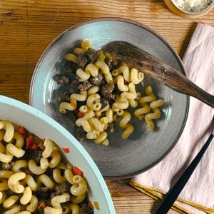 ragu blanco recipe with ground beef, pasta, vegetables, and cheese
