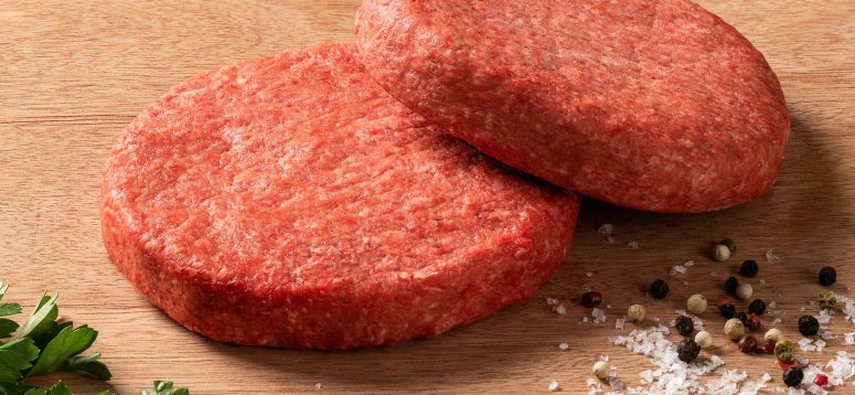 two raw burger patties with an 80/20 lean to fat ratio