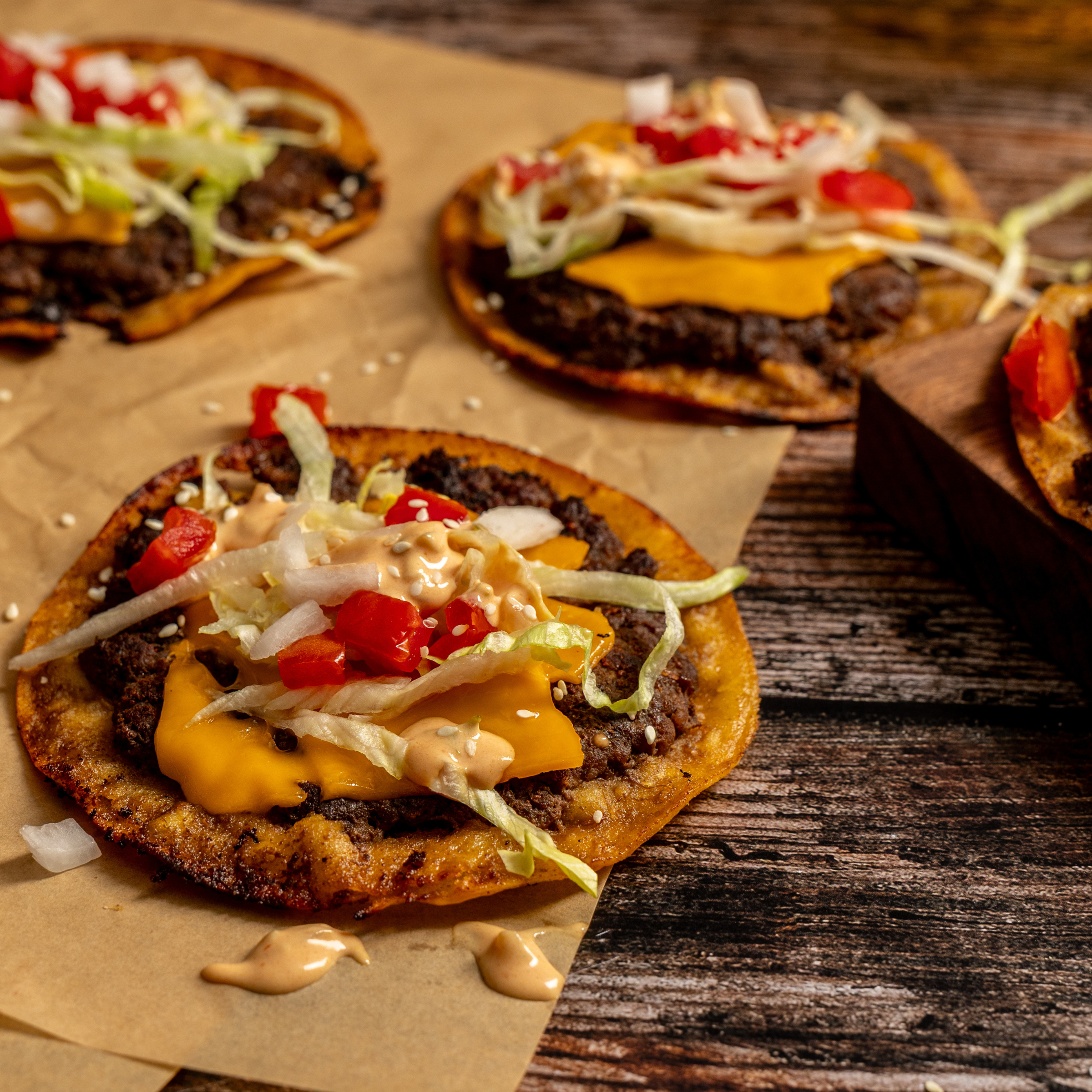 Big Mac Smashburger Tacos made with Schweid & Sons the signature blend sliders and topped with lettuce, cheese, tomatoes, and a special Burger sauce